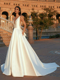 Sexy abito da sposa senza maniche con scollo a V profondo, applicazioni in pizzo, raso, linea ad A, grande fiocco