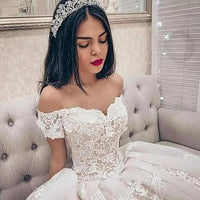 Robes de mariée en dentelle à épaules dénudées pour mariées Appliques Robe de mariée pour femmes Robes de mariée trapèze avec traîne